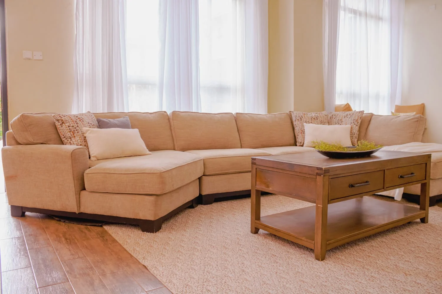 Elegant bedroom with soft textures and warm tones created by Lumina Interiors